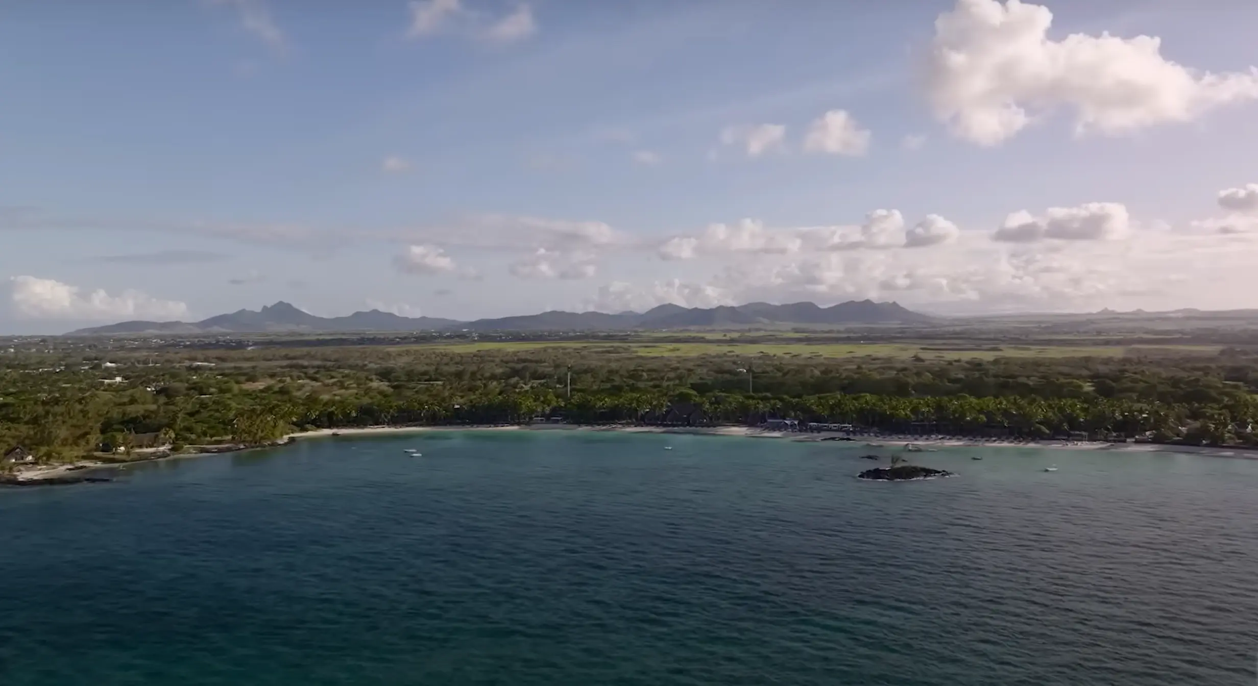 Belle Mare Beach: A Tropical Paradise of Sand, Sun, and Serenity